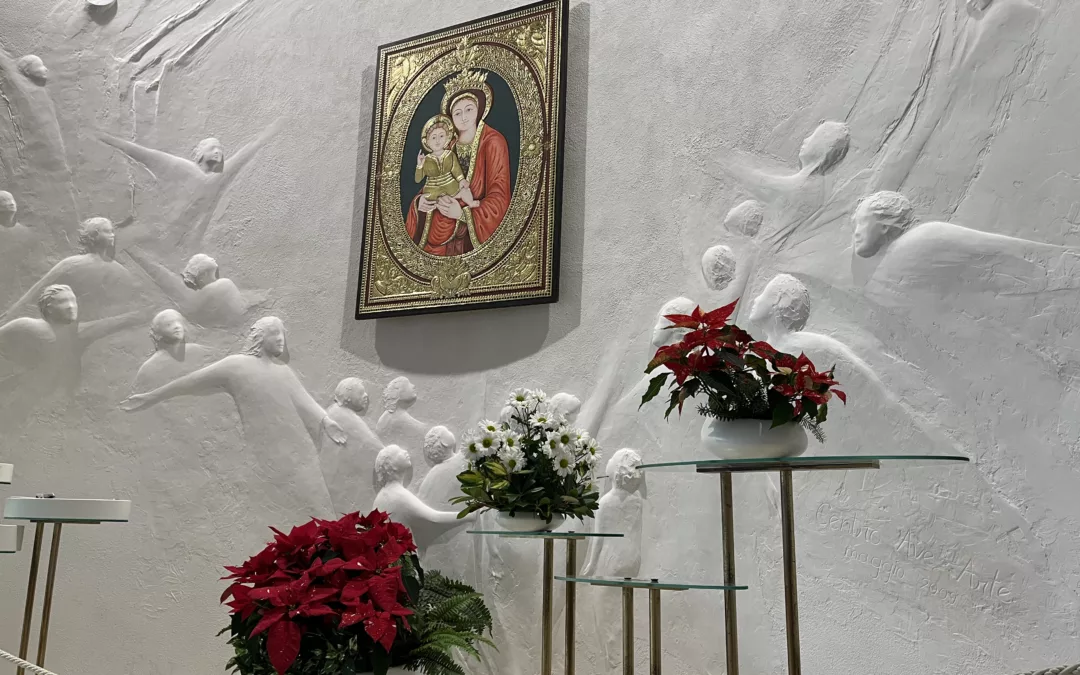 Celebration at the Theotokos, with flowers and a fragment of the Porziuncola